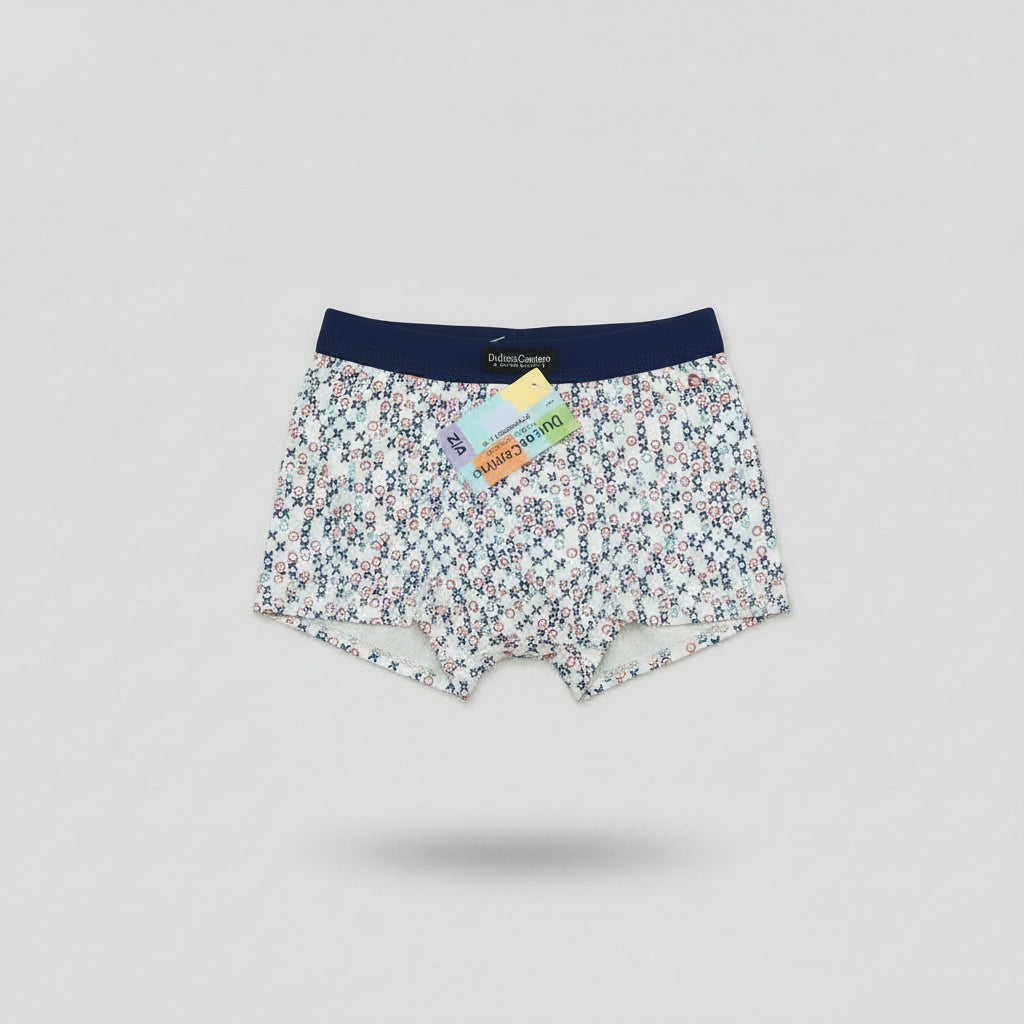 Boxer de rapaz branco com padrão X e O multicolor para crianças dos 2 aos 12 anos