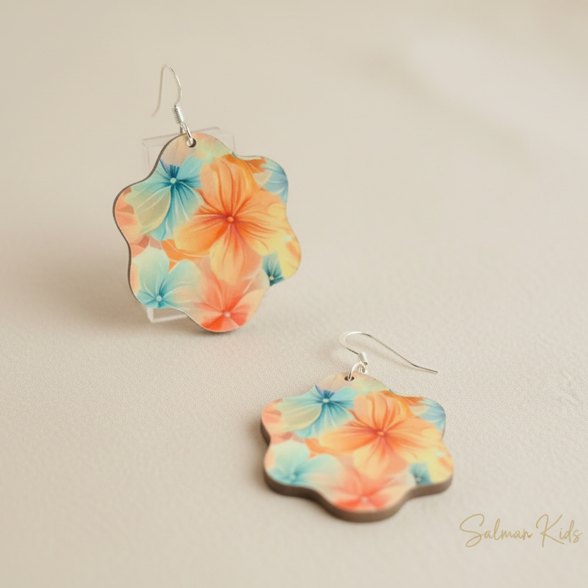 Brincos em mdf e prata, feitos À mão, super leves, super giros. 4 cm de diâmetro.